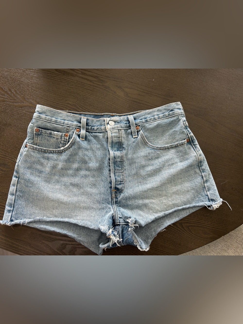 501 Levi's Light Blue Distressed Denim Cutoff Shorts